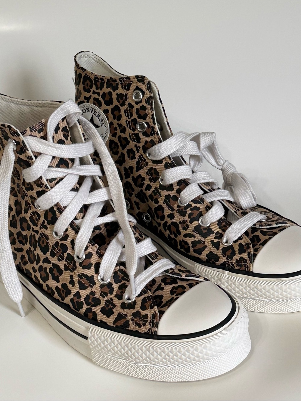 Converse Leopard Print High Top Sneakers in Brown and Black